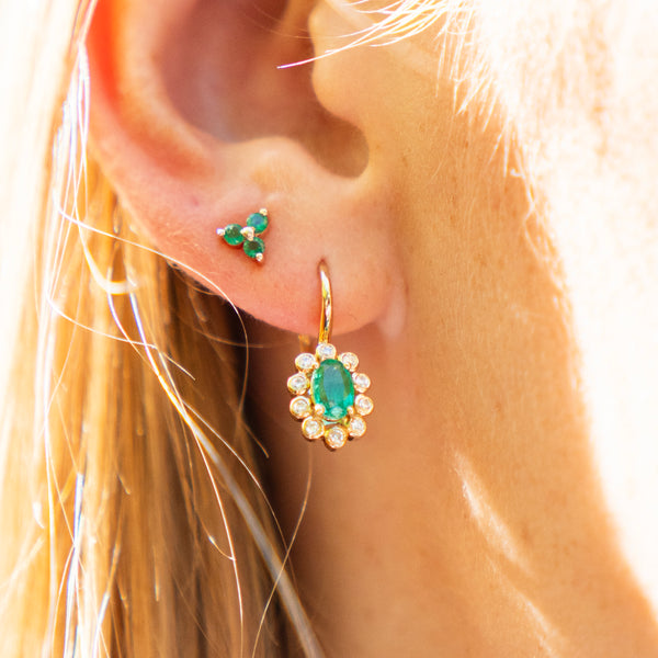 Oval Cut Emerald and Bezel Set Diamond Halo Earrings